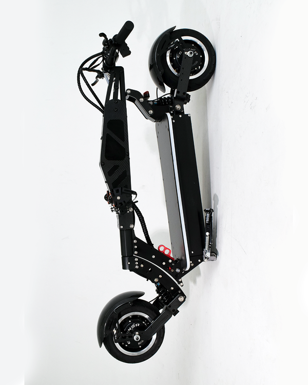 An off-road electric scooter folded for easy storage, showcasing its portability and compact design. The scooter’s durable construction is visible even in the folded state.