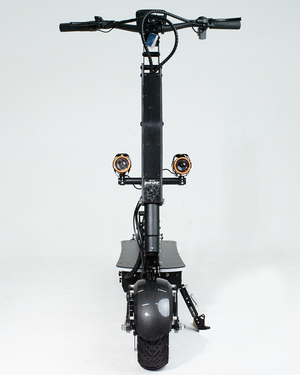 A front view of an electric scooter equipped with dual bright headlights, showcasing its modern design and advanced lighting system. The scooter is built for both urban commuting and off-road use.