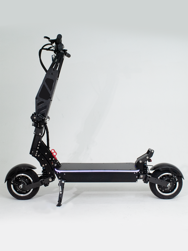 A side profile of a black electric scooter with a minimalist design, suitable for both urban commuting and off-road adventures. The scooter features a large deck and sturdy frame for enhanced stability.