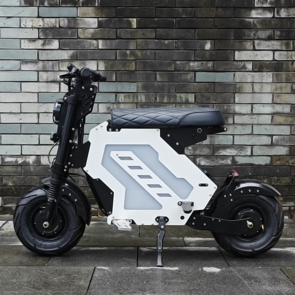 A side view of an electric motorbike with a quilted seat and modern design, parked against a patterned brick wall. The bike showcases a unique and geometric aesthetic suitable for urban commuting.